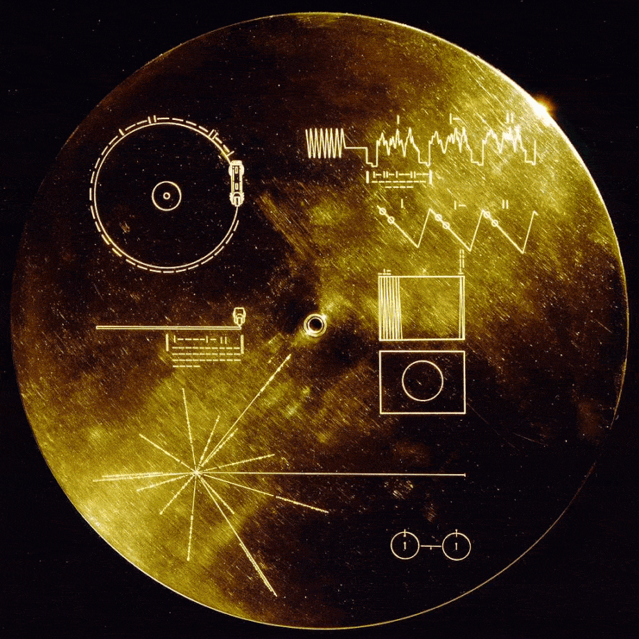 An image of the Voyager Golden Record, a gold-plated phonograph record containing sounds and images representing Earth, intended for extraterrestrial beings. It includes scientific diagrams, music from different cultures, and greetings in multiple languages.